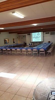 Dining hall at the Woodland Masonic Lodge with outside view of the full kitchen