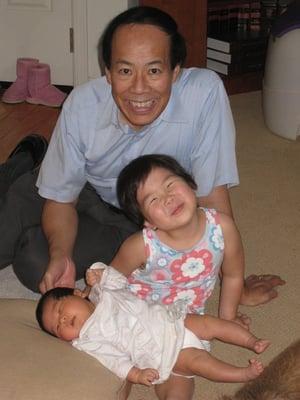 Dr. Leonard Chong with his grand-daughters.