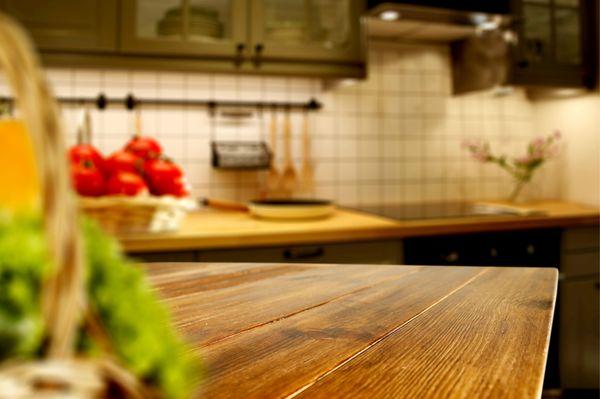 Kitchen Cleaning. Kitchen with wooden counter tops.