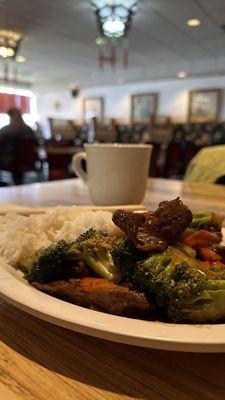 Broccoli Beef and Hot Tea, with the main dining room pictured in the background