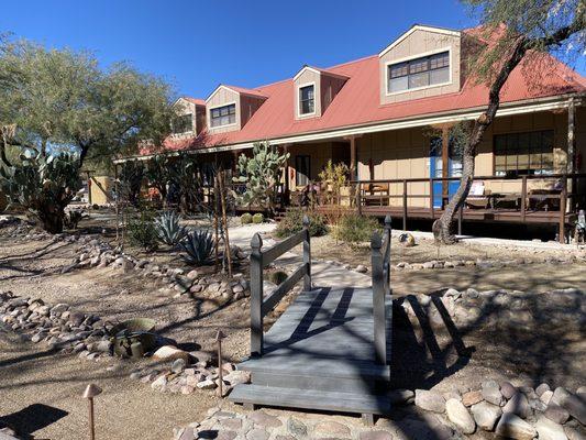 Photo taken from very nice courtyard area where there are a couple different sitting areas and a gas fire pit