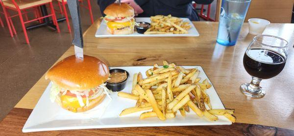 Chicken Sandwich And Fries In Front.  FBC Burger And Fries In Back.