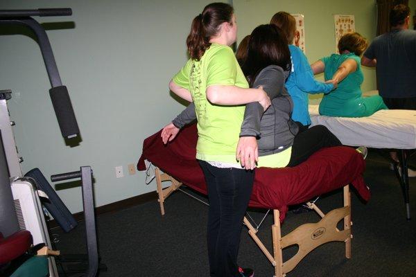 Students Learning Stretching Techniques