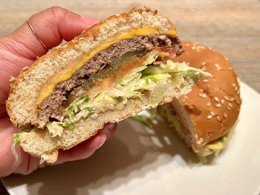 Cheeseburger. Beef patty, tomatoes, onions, cheese, lettuce, and thousand island sauce on a toasted bun. A great burger to try out!