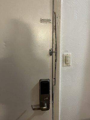 Door had been busted into multiple times (2 different locks broken).