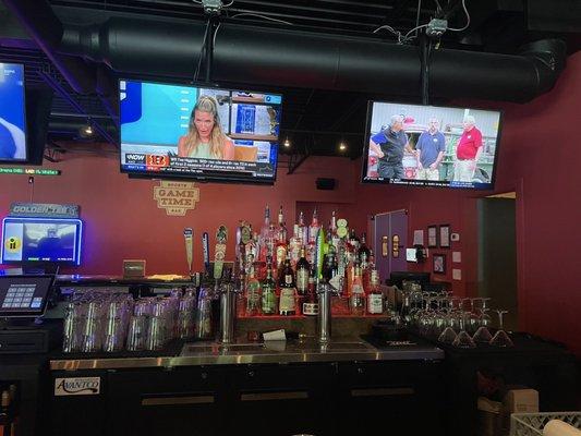 Lots of tv monitors around the bar