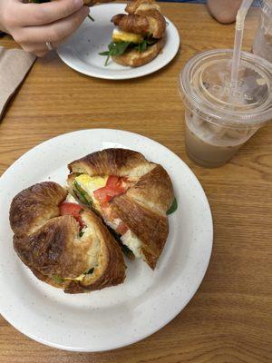 breakfast croissant and iced latte