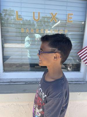 Highly recommend Luxe Barbershop! We love going to Liz for my son's haircuts. His favorite thing is to get a lightning bolt on the side.