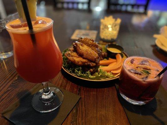 Honey curry wings, rum punch and sorrel with rum