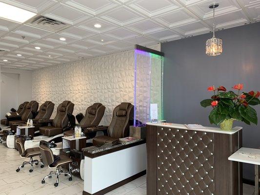 The reception area and one side of the pedicure area. The massage chairs are awesome.