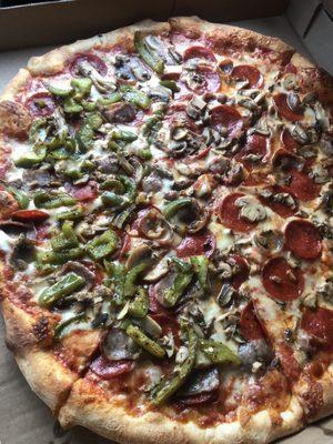 The usual Sausage, Pepperoni, & Mushrooms buuuut this time we added Half Hot Peppers 5-7-2021