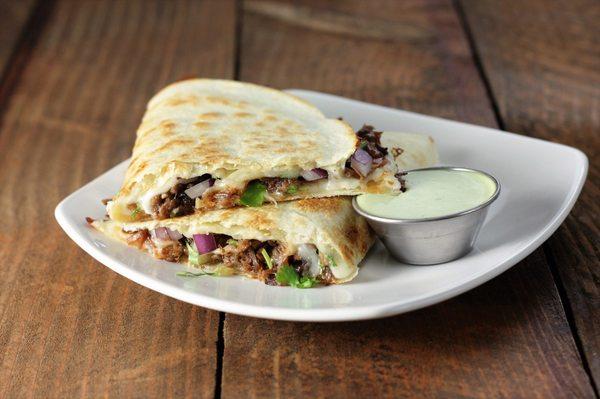 LONE STAR - house smoked brisket, red onion, cilantro, BBQ drizzle... served with scratch Jalapeno Ranch