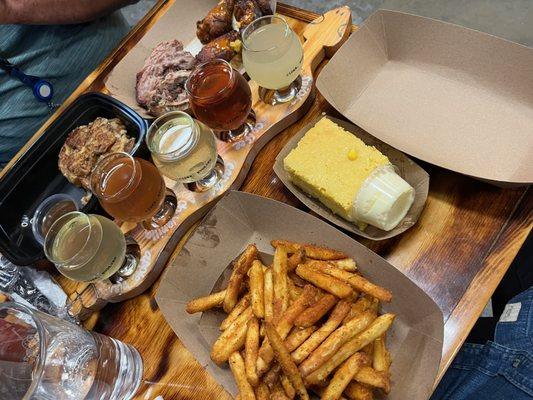 3x2 (sides: cajun fries & corn bread) along with a flight of ciders from Serpentine