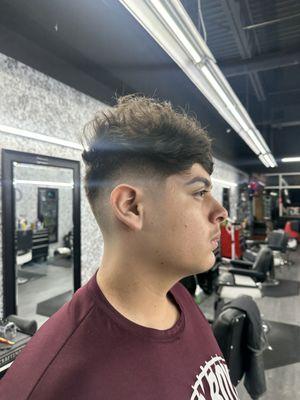 Another look at a flawless cut. Scissor cut with fade.