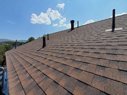 Roof tear-off, new underlayment installation, expert roof replacement los angeles Timberline Hickory shingle roof installation