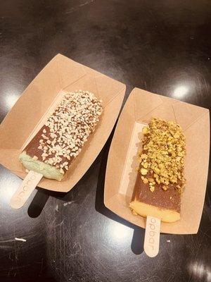 Pistachio gelato, dipped with dark chocolate and almonds. Pineapple sorbet, dipped in dark chocolate and pistachio.