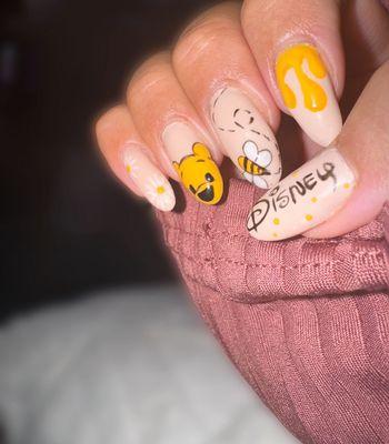 Preparation for my trip to magic kingdom. Pooh nails!