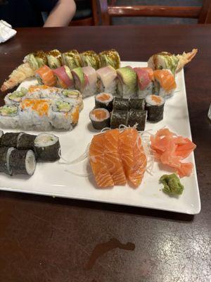 Rocky 2 roll (I think), rainbow roll, California roll, salmon roll, scallop roll, and salmon sashimi