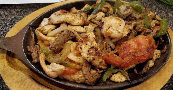 Chicken beef shrimp fajitas