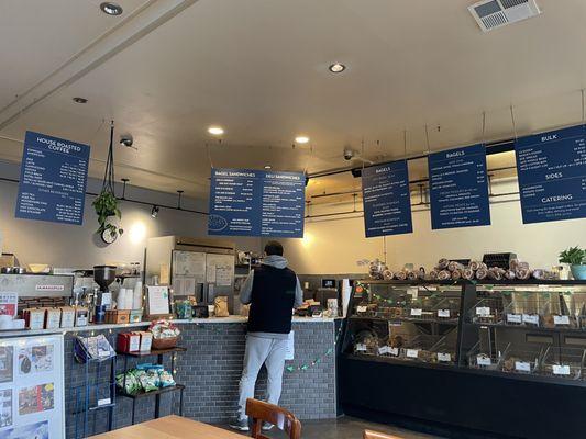 Menu, bagel case, cashier