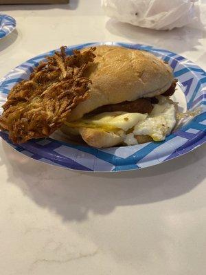 Sausage Egg and cheese with a potato cake