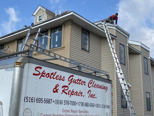 Seamless gutters being installed. Nassau County New York Long Island