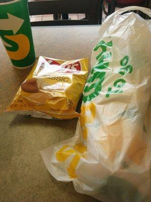 Footlong with chips and a drink.