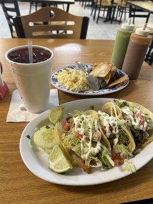 Tacos Al pastor, chicken, and beef. Refried beans and rice.