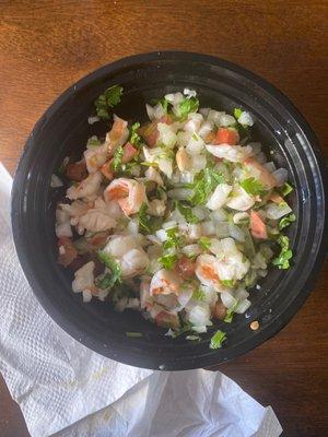 "Ceviche" supposedly. It's just pico de gallo , with tiny bits of shrimp. Don't waste your money.