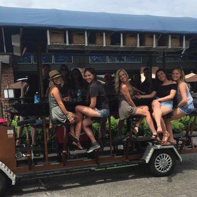 This Touring bike pedals your way through South Broadway on a Booze cruise Bike bar Patio ride!