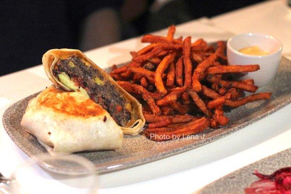 Black Bean Wrap ($20) - avocado, cheddar, pico de gallo, chipotle aioli, sweetie fries