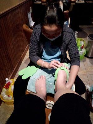 Getting a lovely, relaxing pedicure from Van!