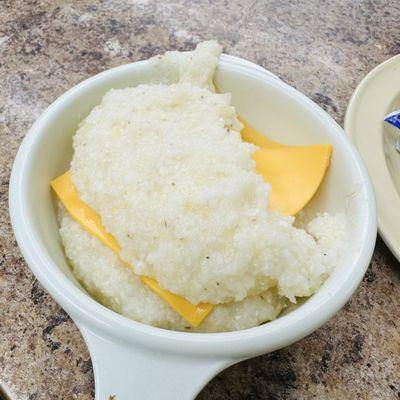 Grits with cheese. $0.60 extra for cheese