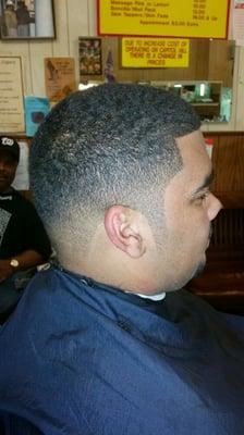 This is a low ceasar cut with faded side burns