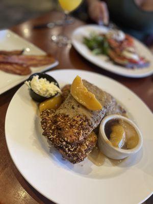 Pecan crusted French toast with caramel peaches and whiskey syrup