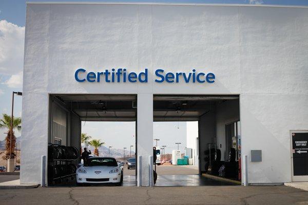 Are you here for the service department? Please pull in we will be happy to assist you.