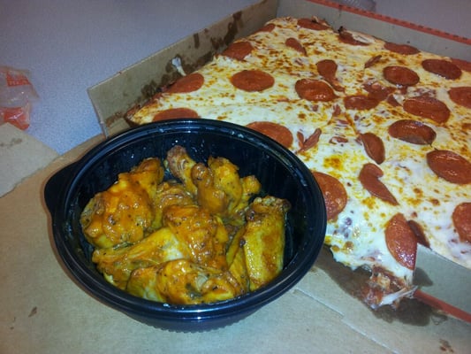 Delicious hot wings and deep-dish pizza.