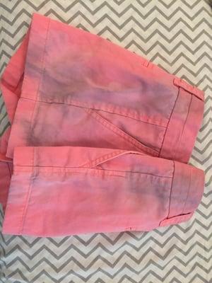 J. Crew pink shorts returned to me stained. Wash-and-fold AT YOUR OWN RISK.