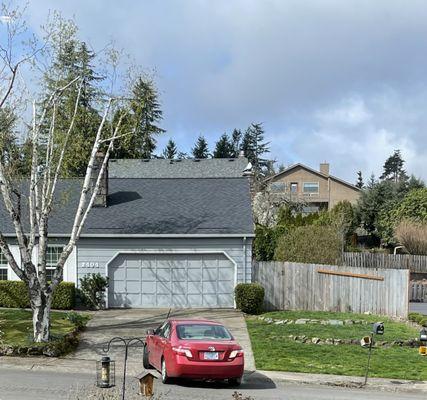 Look how they repair a fence. That garage door is original and will fall on you.