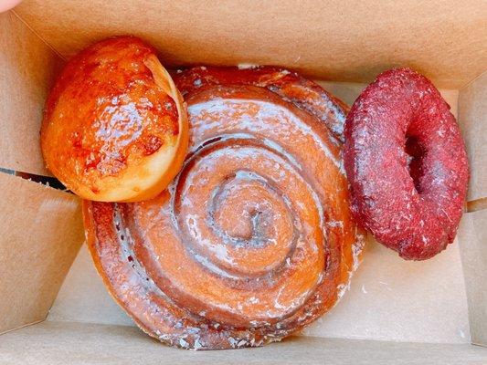 I chose the Creme Brulee (filled with reg custard, not Creme Brulee custard); Cinnamon Roll; Red Velvet cake donut