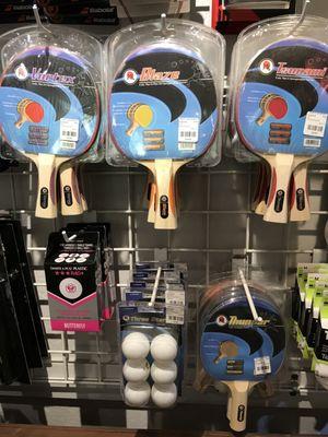 Table Tennis paddles, balls, and accessories.