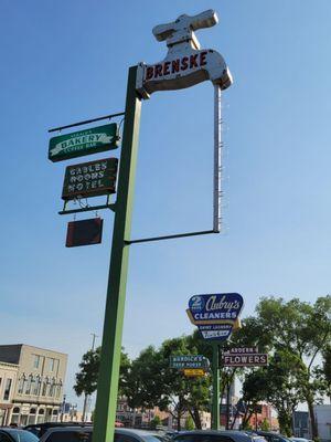 Cool retro signs in the parking lot across the street.