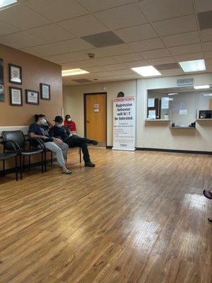 The waiting room with patients waiting to be seen.