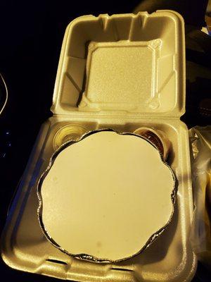 Carryout order in a Styrofoam box, with the actual wet burritos safely in another sealed container...no worries of leakage.