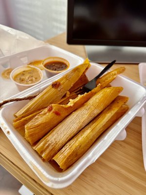 Half dozen tamales with complimentary cheese dip and chili. The cheese dip and chili are phenomenal.