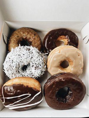 Blueberry donut  Chocolate glaze  Chocolate coconut Vanilla Swirl Maple donut  Double chocolate cake donut