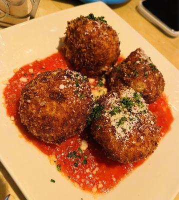 The Mac & Cheese bites, Hands down best appetizer ever & marinara sauce delicious. Down side? $16 for 4 balls!! Ouch!