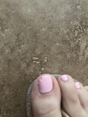 THIS IS MY PEDICURE 4 days later. Chipped GEL nail polish. Ridiculous!! Don't come here!