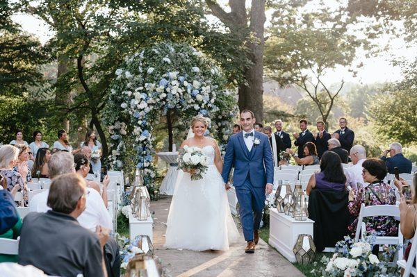 A happy couple after their wedding ceremony.