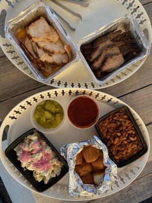 Brisket, turkey breast, beans, rolls, potato salad, pickles, bbq sauce